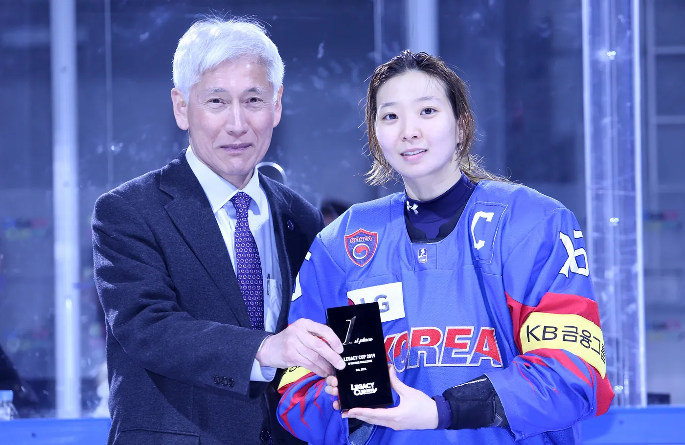 Susie Jo receiving a trophy
