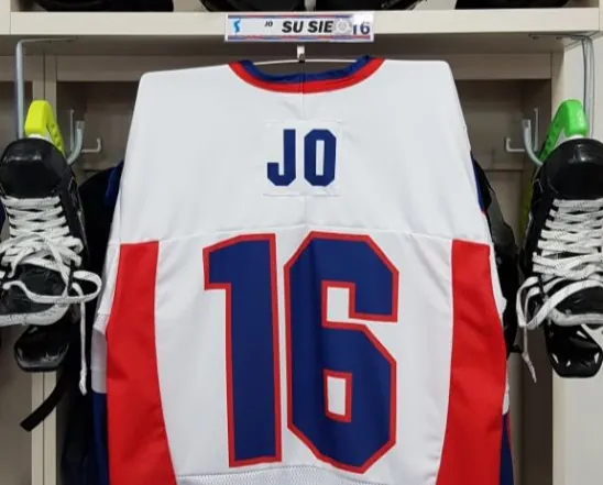Susie Jo's number 16 Korea jersey hanging in the dressing room