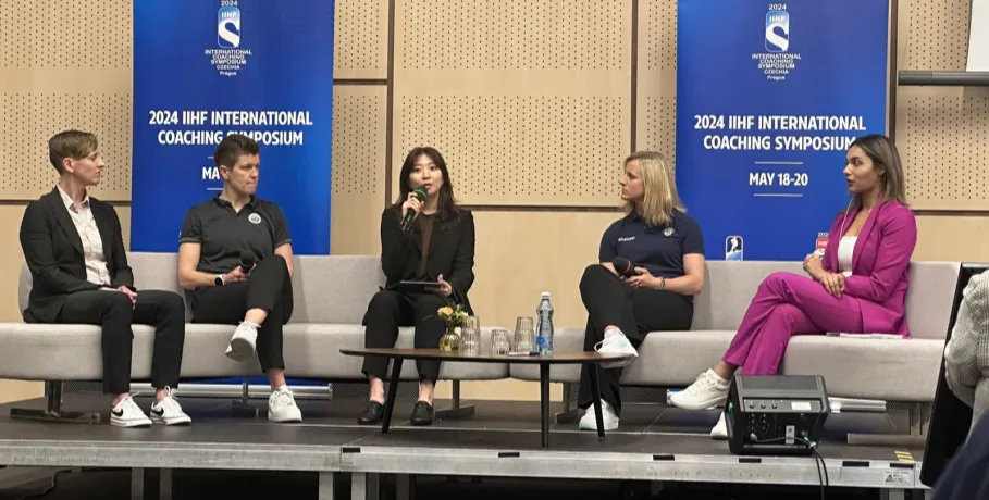 Susie Jo on a panel at the 2024 IIHF International Coaching Symposium